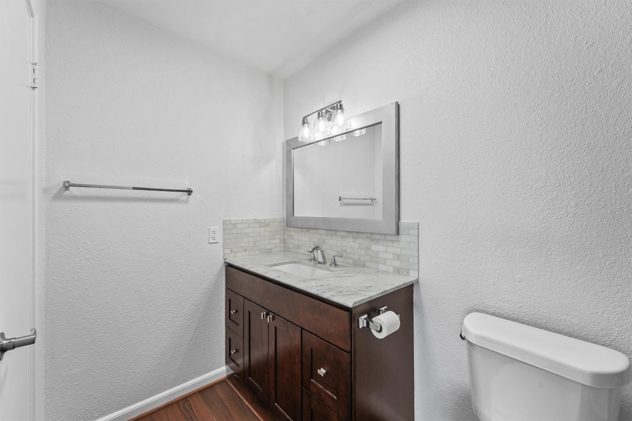 11550 Chimney Rock Road, Unit 536 Houston, TX 77035 - Photo 22 of 28 Secondary bathroom - totally renovated with updated countertop, light fixture and mirror, toilet, and tub/shower combo