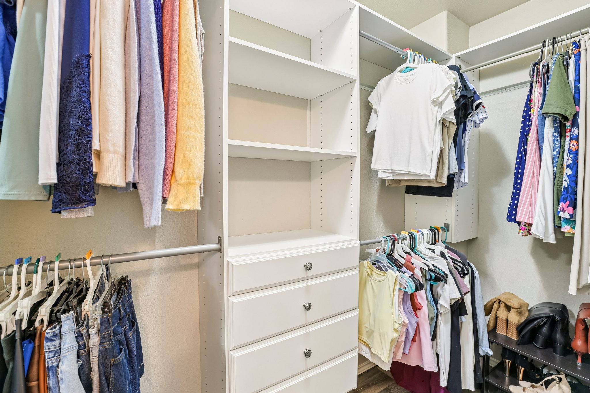5508 Emma Thompson Way Austin, TX 78747 - Photo 26 of 34 Primary walk-in closet has built in's to add to the functionality.
