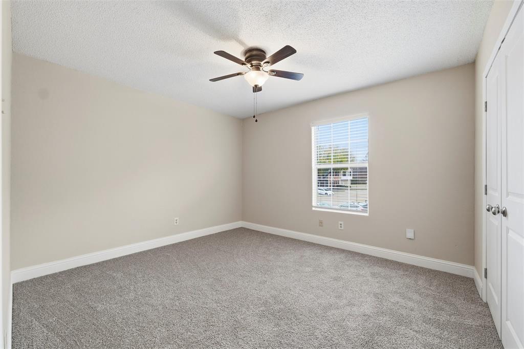112 Churchill Lane Euless, TX 76039 - Photo 24 of 33 a view of an empty room with a window