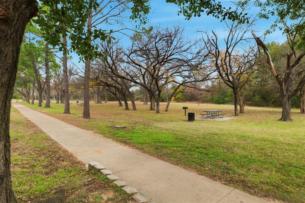 112 Churchill Lane Euless, TX 76039 - Photo 32 of 33 a view of yard with tree