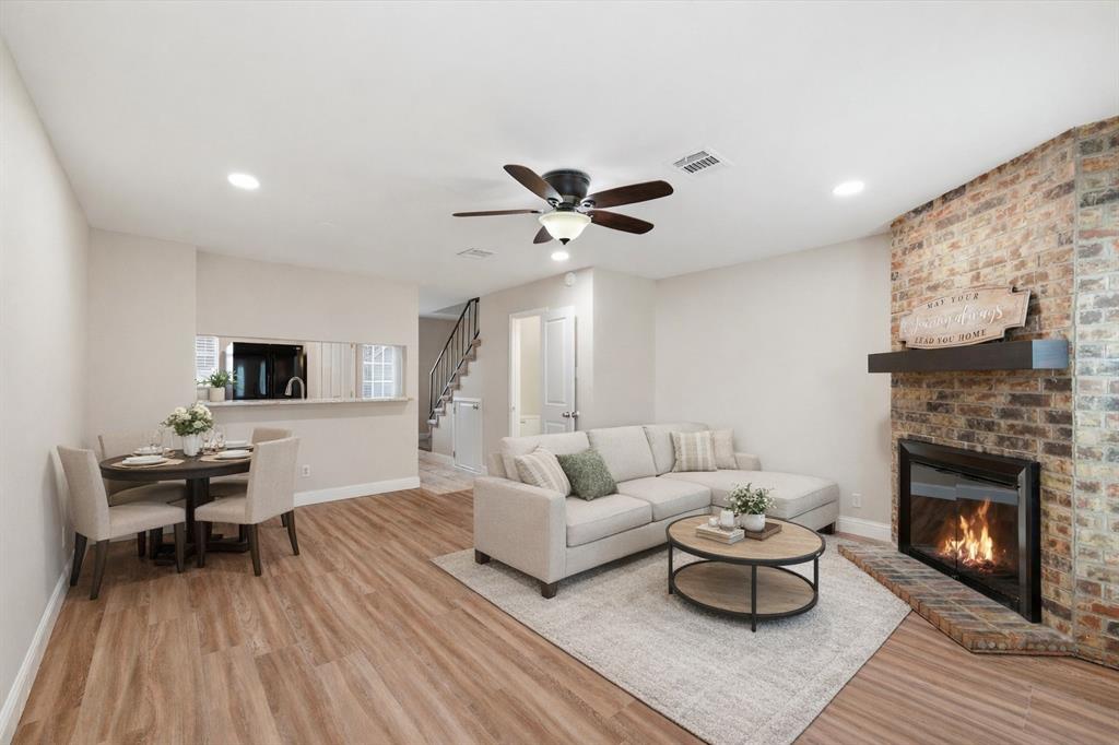 112 Churchill Lane Euless, TX 76039 - Photo 6 of 33 a living room with furniture and a fireplace