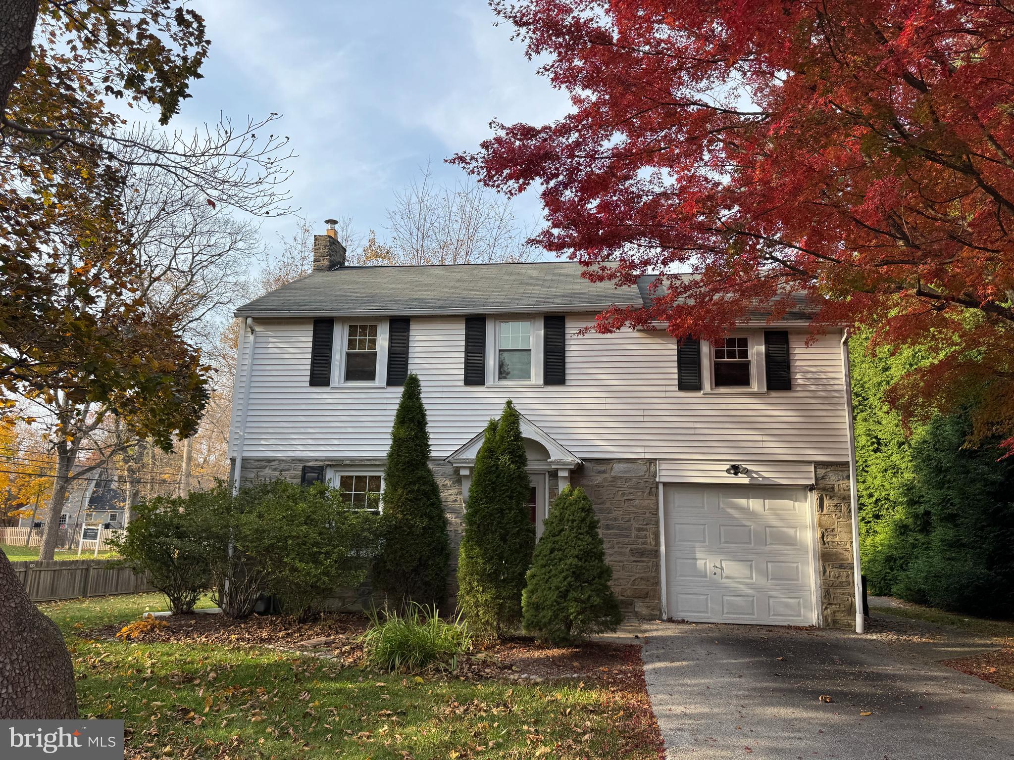 412 Grange Road Wayne, PA 19087 - Photo 1 of 27 a front view of a house with garden