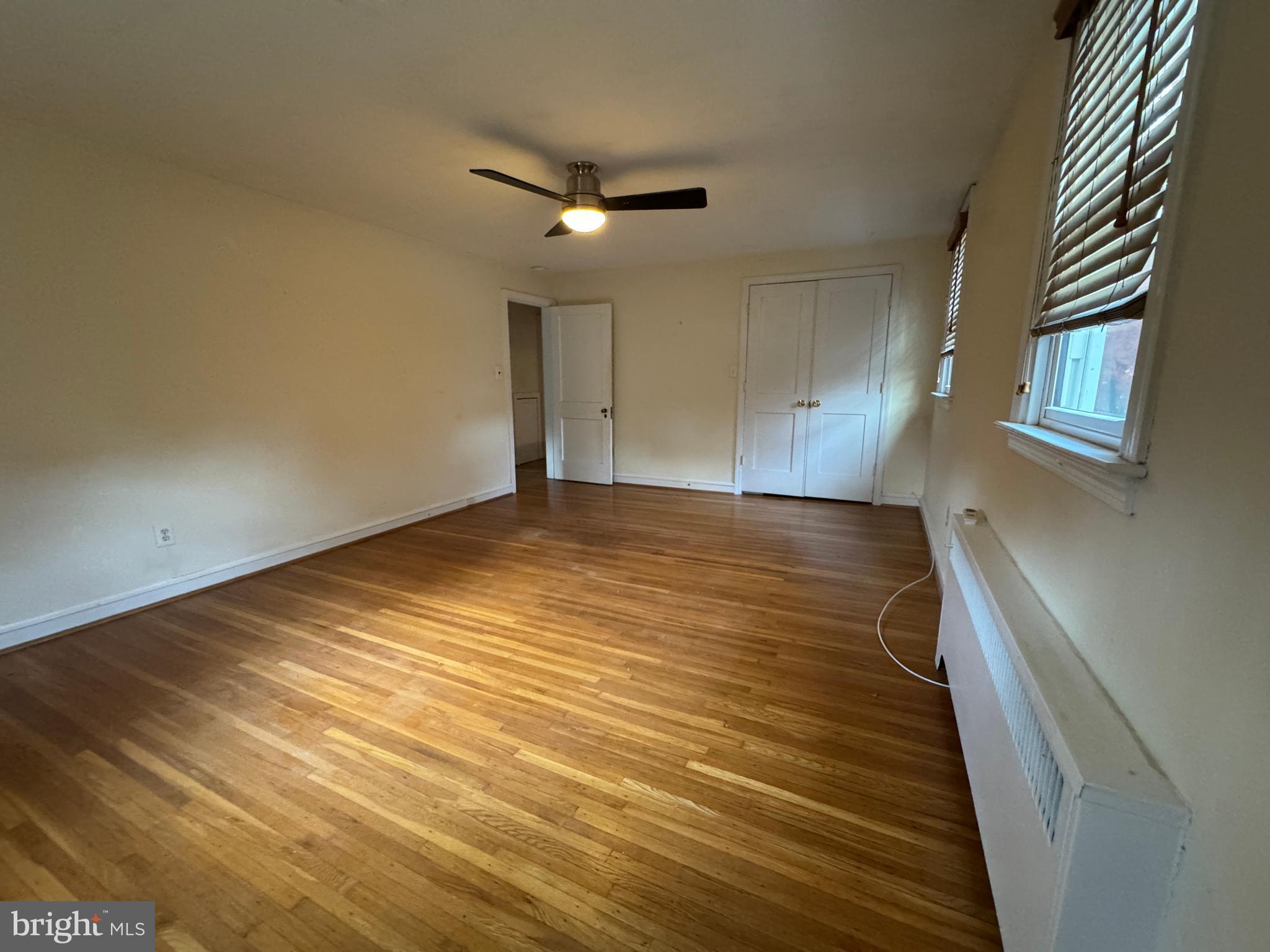 412 Grange Road Wayne, PA 19087 - Photo 20 of 27 a view of an empty room with wooden floor