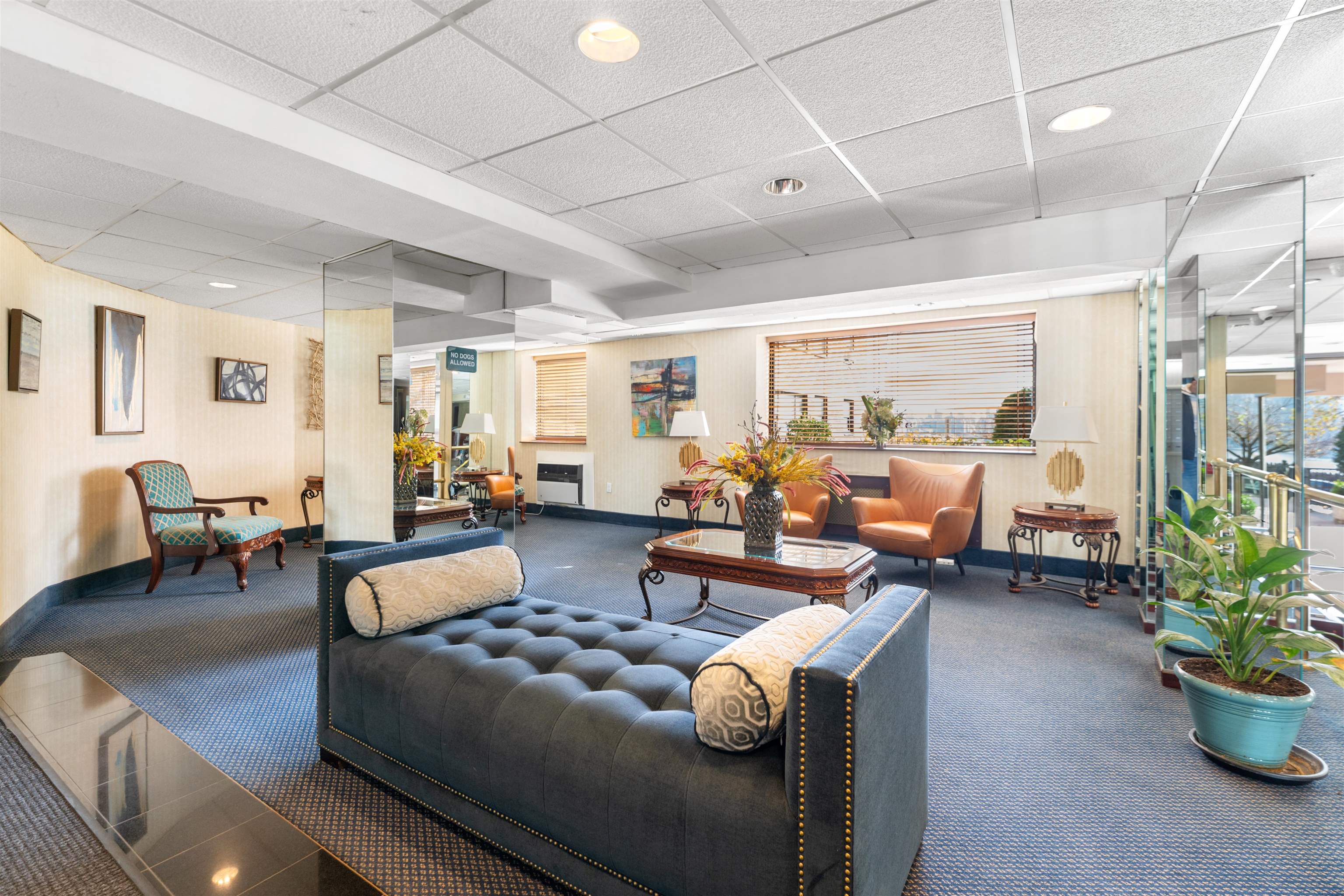 6515 JFK Boulevard East, Unit 4C West New York, NJ 07093 - Photo 11 of 14 a living room with furniture and a large window