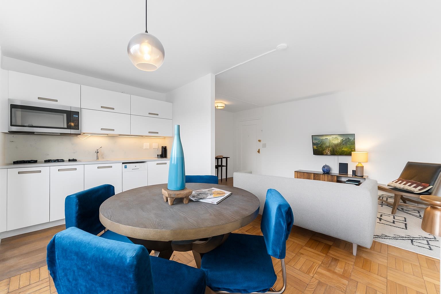 6515 JFK Boulevard East, Unit 4C West New York, NJ 07093 - Photo 2 of 14 a view of a dining room with furniture and wooden floor