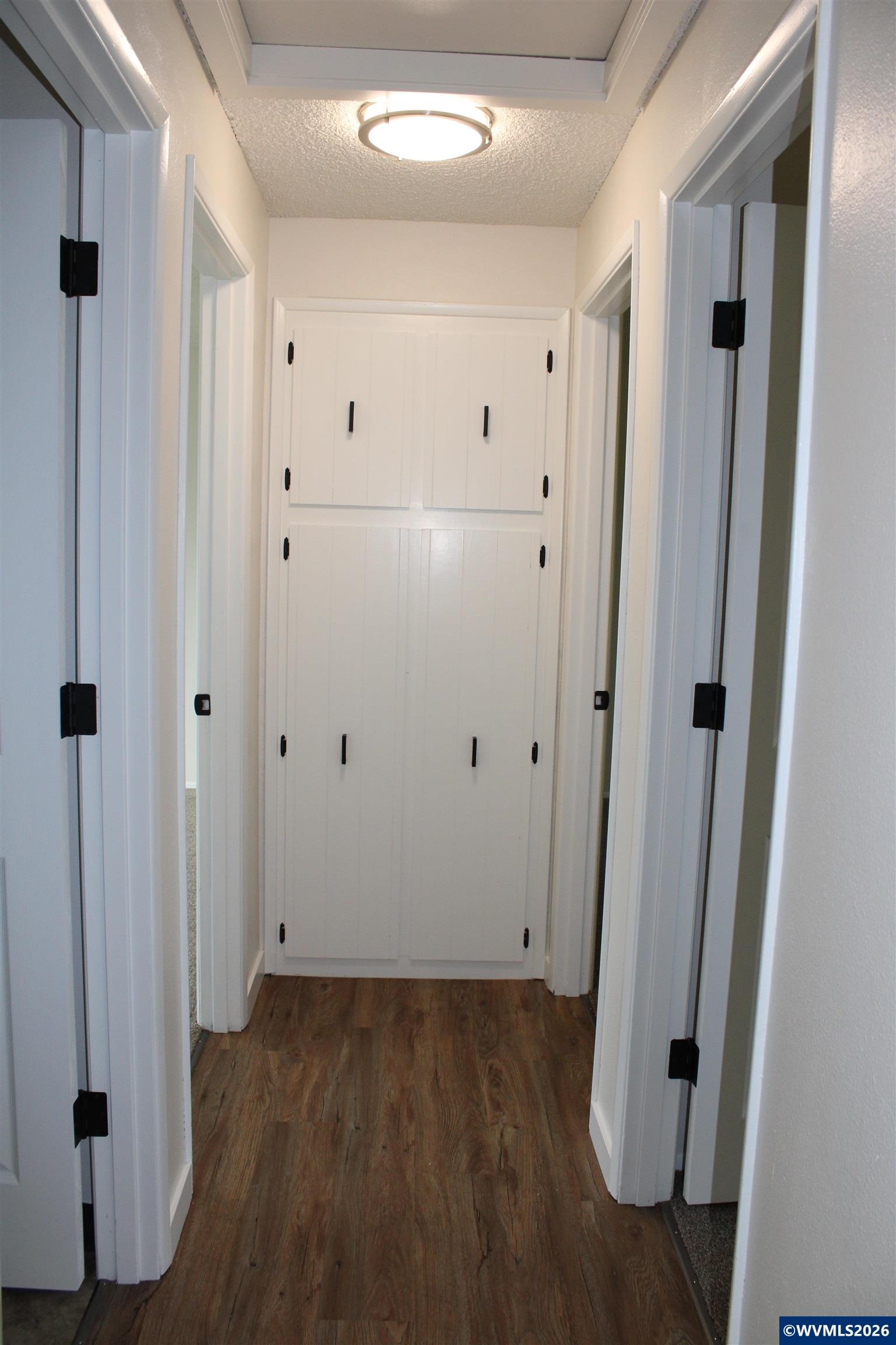 6259 Chapman Place Southwest Albany, OR 97321 - Photo 10 of 21 a view of a hallway with wooden floor and closet area
