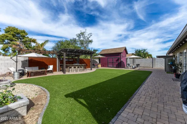 a house view with a garden space
