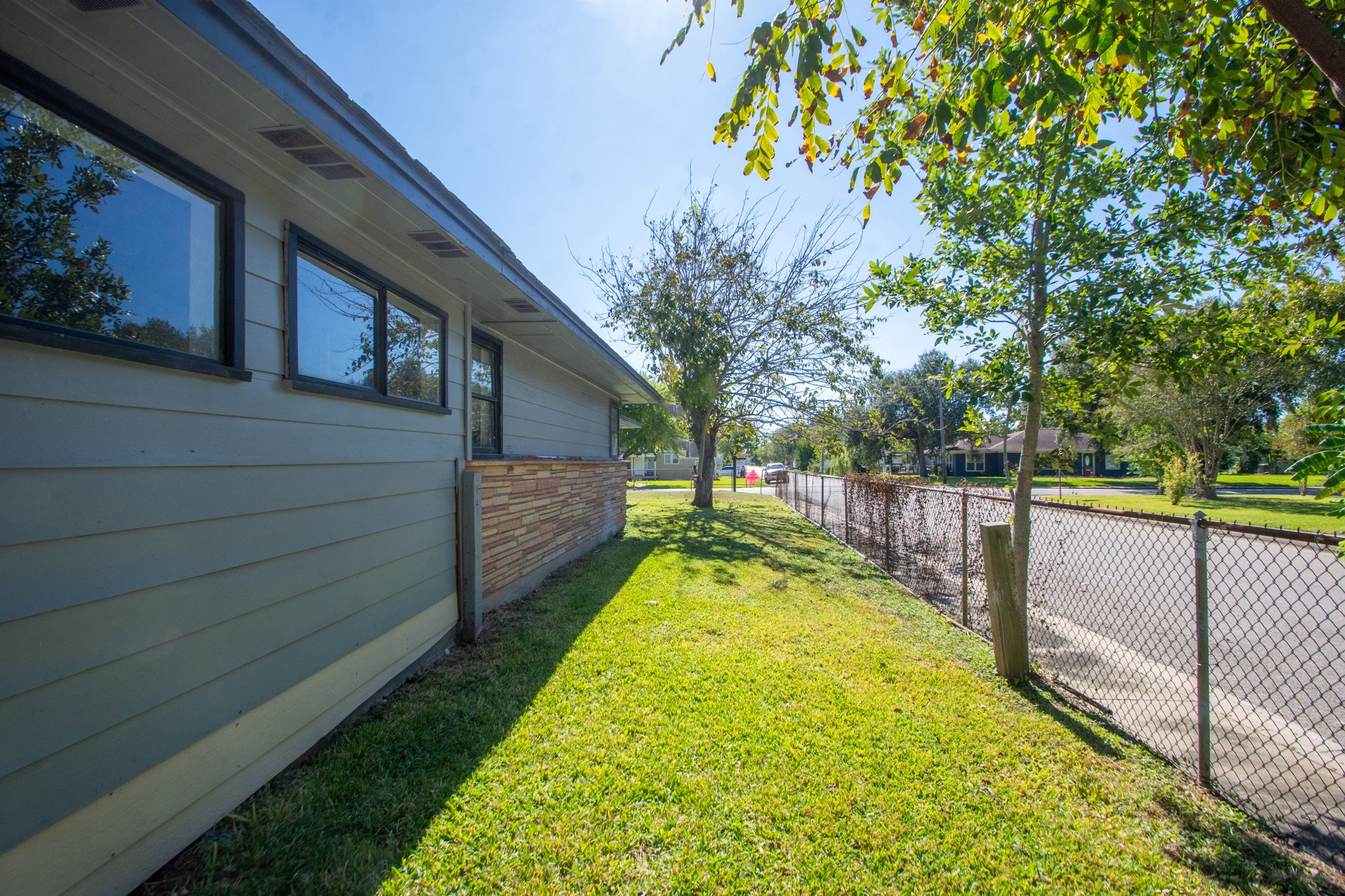 1230 West 4th Street Freeport, TX 77541 - Photo 42 of 49 Left side fenced yard.