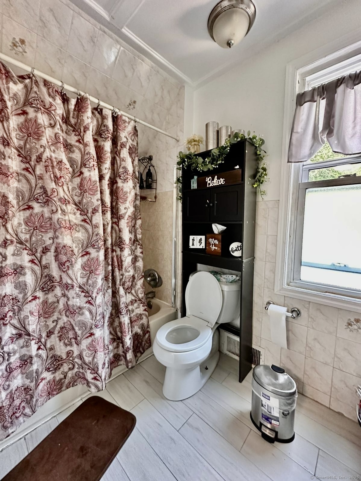 444 Poplar Street New Haven, CT 06513 - Photo 12 of 17 a bathroom with a toilet and a shower curtain