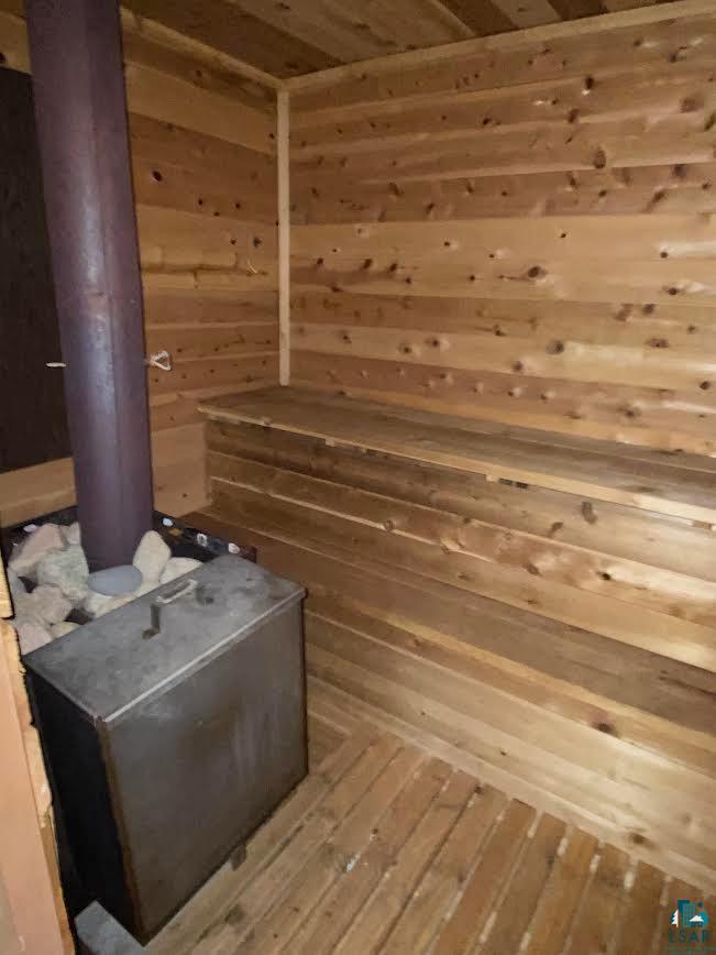 1896 Echo Trail Ely, MN 55731 - Photo 11 of 20 Relaxing sauna with wooden walls and wood-type flooring