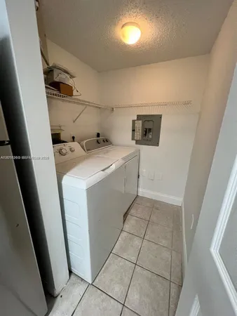 $287,500 | 5065 Wiles Road, Unit 103, Coconut Creek, FL 33073