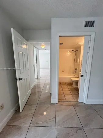 $287,500 | 5065 Wiles Road, Unit 103, Coconut Creek, FL 33073