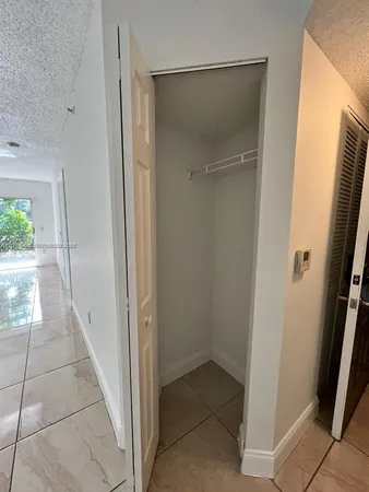 $287,500 | 5065 Wiles Road, Unit 103, Coconut Creek, FL 33073