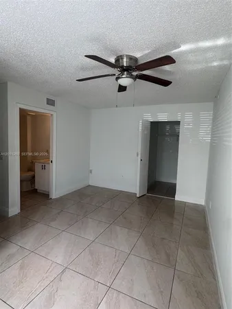 $287,500 | 5065 Wiles Road, Unit 103, Coconut Creek, FL 33073