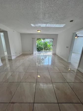 $287,500 | 5065 Wiles Road, Unit 103, Coconut Creek, FL 33073