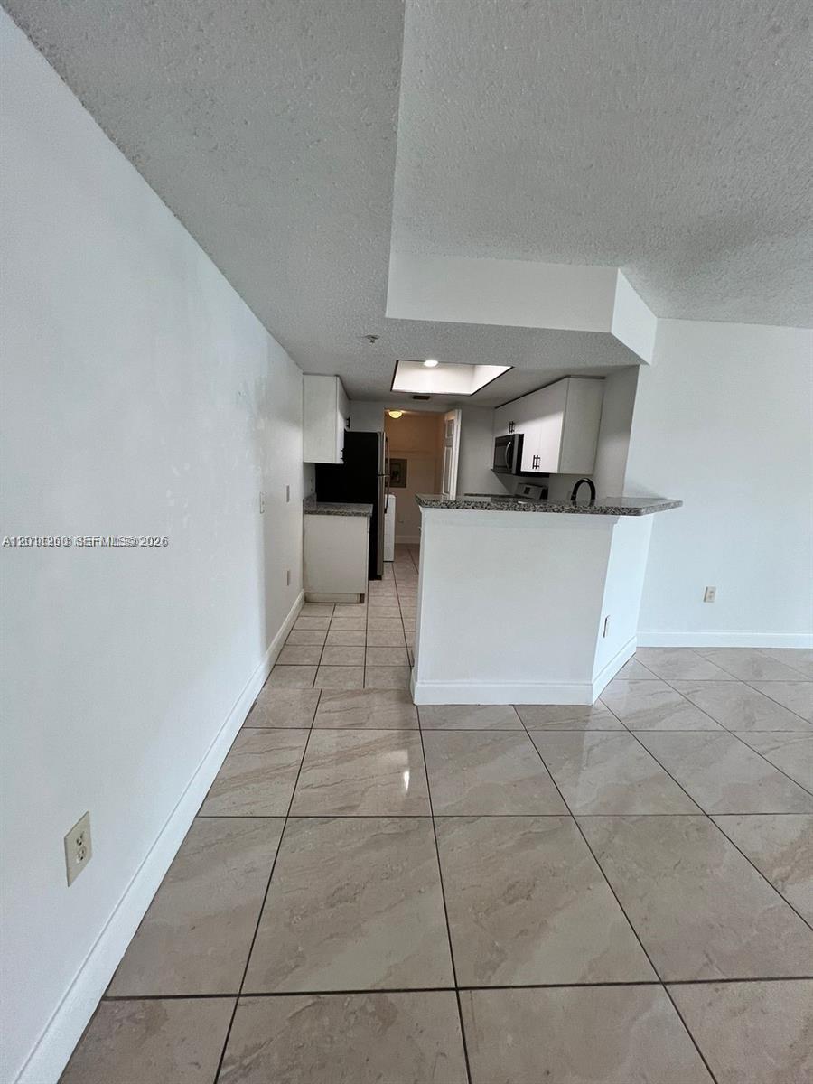 5065 Wiles Road, Unit 103 Coconut Creek, FL 33073 - Photo 10 of 47