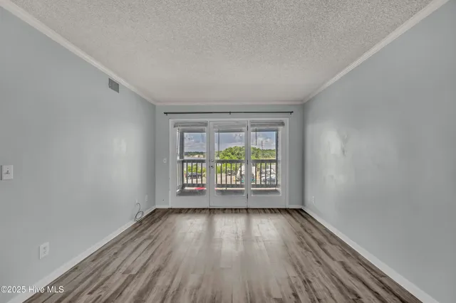 $300,000 | 400 Virginia Avenue, Unit 203B, Carolina Beach, NC 28428