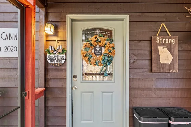 a kitchen with stainless steel appliances granite countertop a stove sink and cabinets