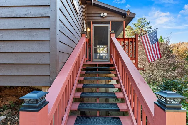 a view of a balcony with chairs