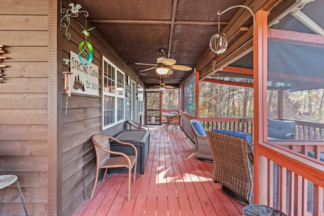 a view of balcony with furniture