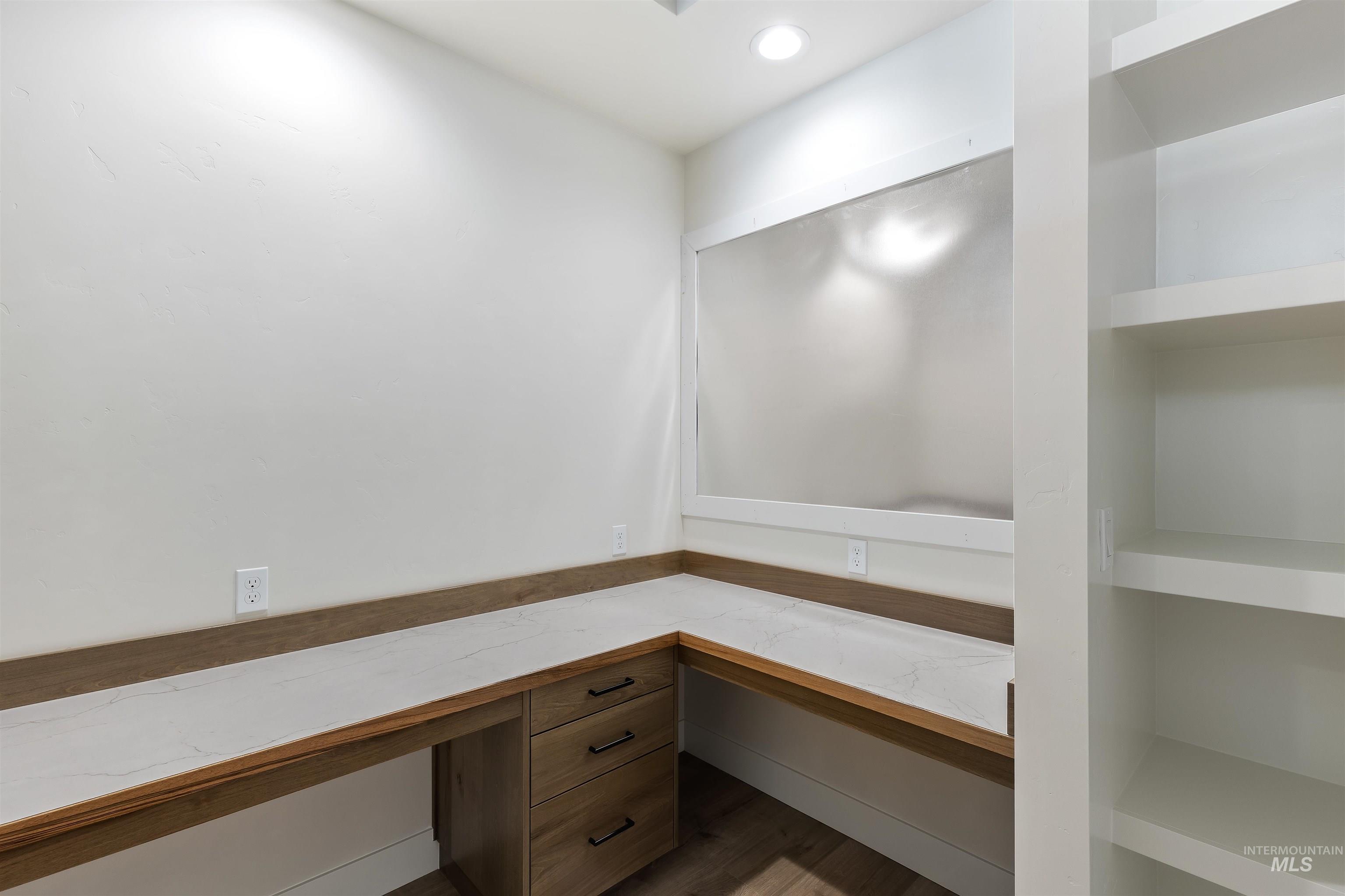 3501 South El Rio Avenue Boise, ID 83709 - Photo 17 of 31 Unfurnished office featuring built in study area, recessed lighting, and wood finished floors