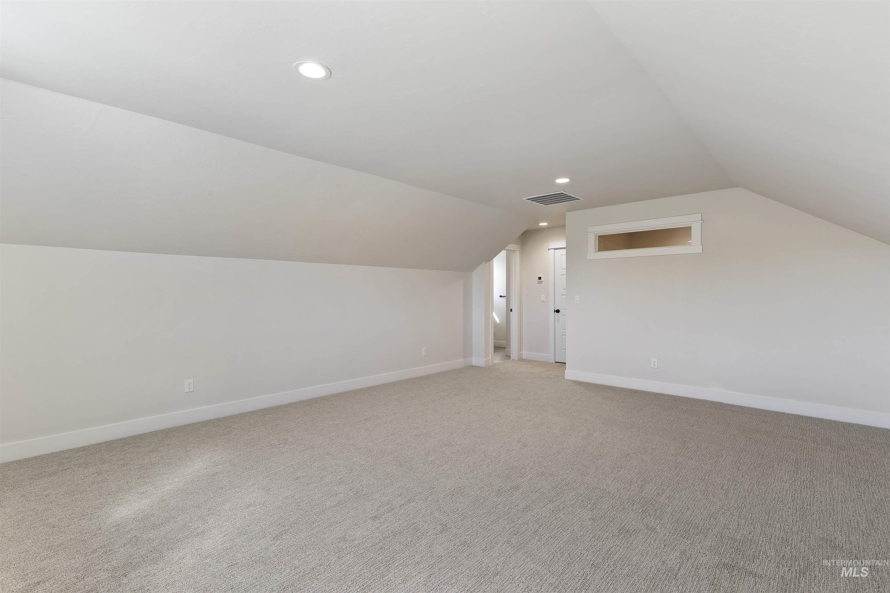 3501 South El Rio Avenue Boise, ID 83709 - Photo 20 of 31 Bonus room with light colored carpet and recessed lighting