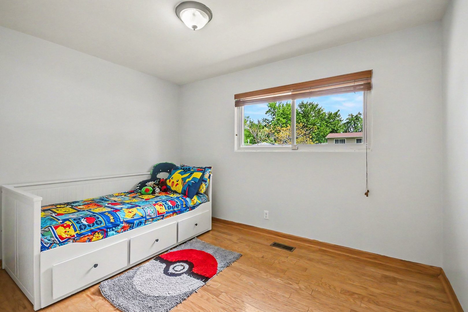 48 Pueblo Road Montgomery, IL 60538 - Photo 16 of 33 a room with toys and wooden floor