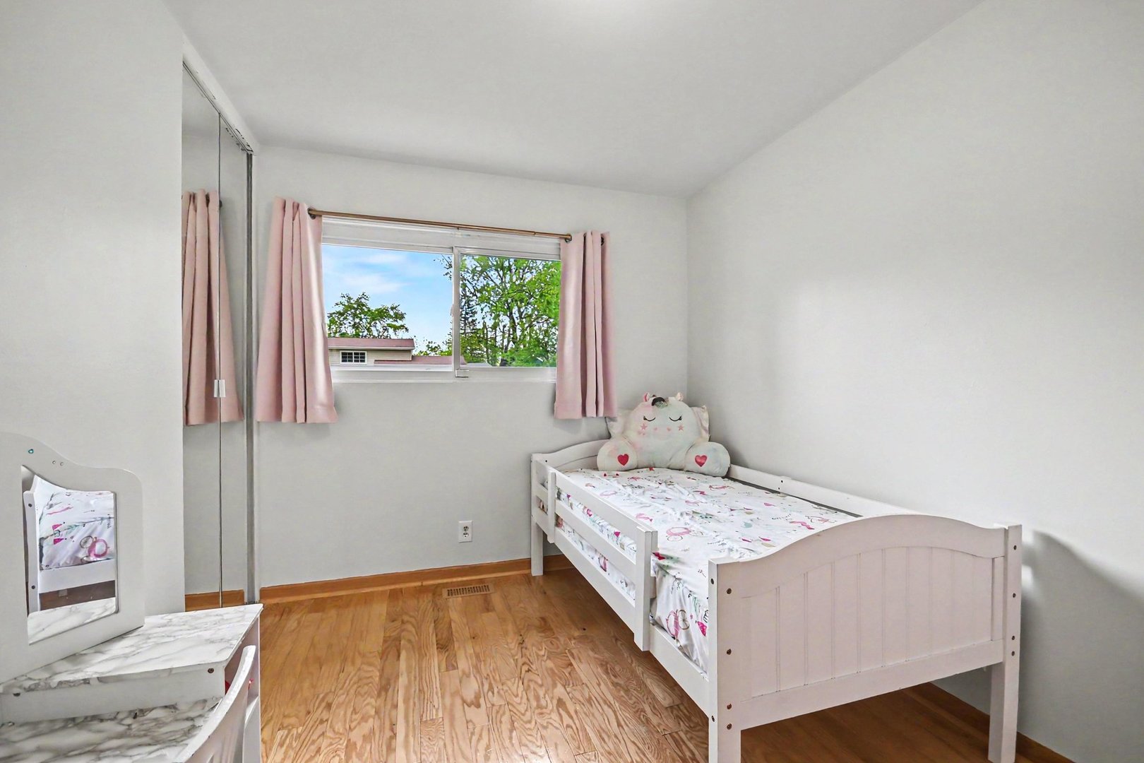 48 Pueblo Road Montgomery, IL 60538 - Photo 17 of 33 a bedroom with a bed and a window
