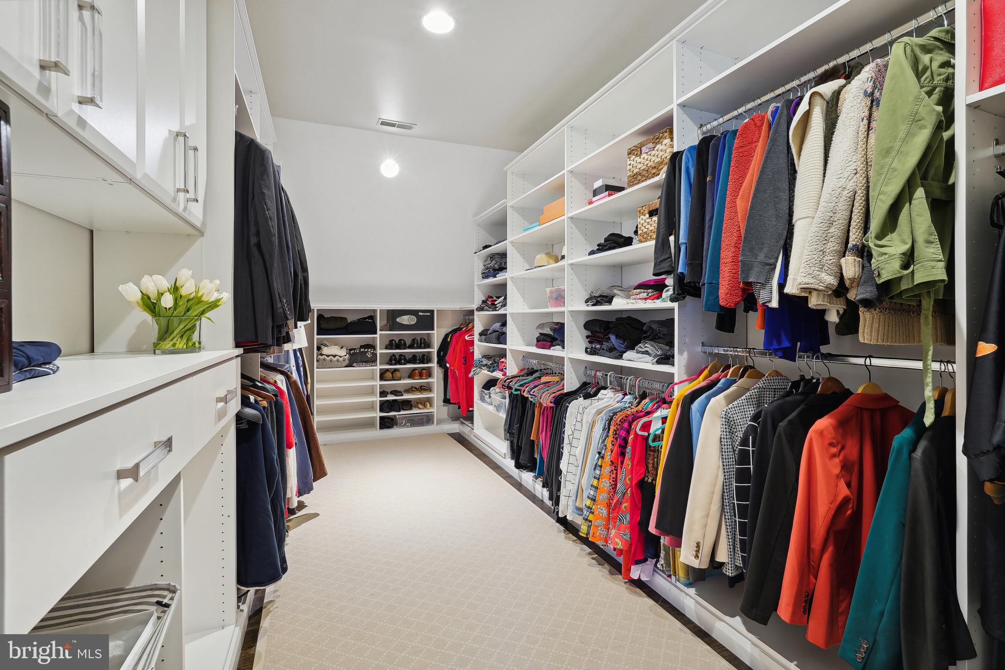 8402 Rapley Ridge Lane Potomac, MD 20854 - Photo 26 of 54 Upper level primary bedroom walk-in closet