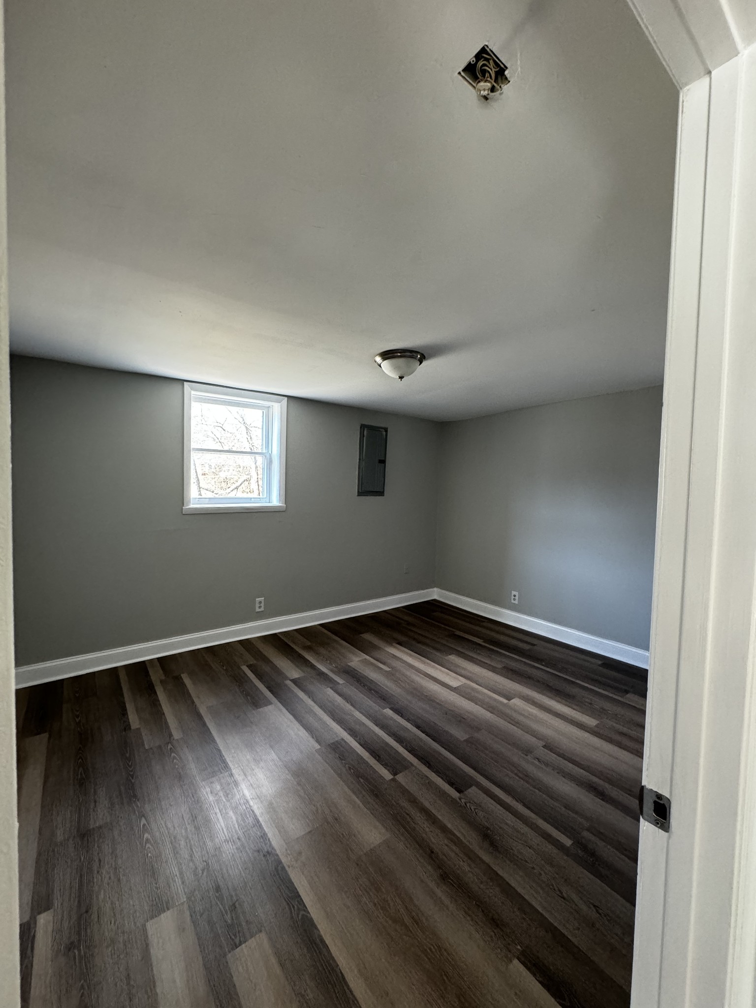 1814 County Hospital Road Nashville, TN 37218 - Photo 13 of 18 a view of an empty room and wooden floor