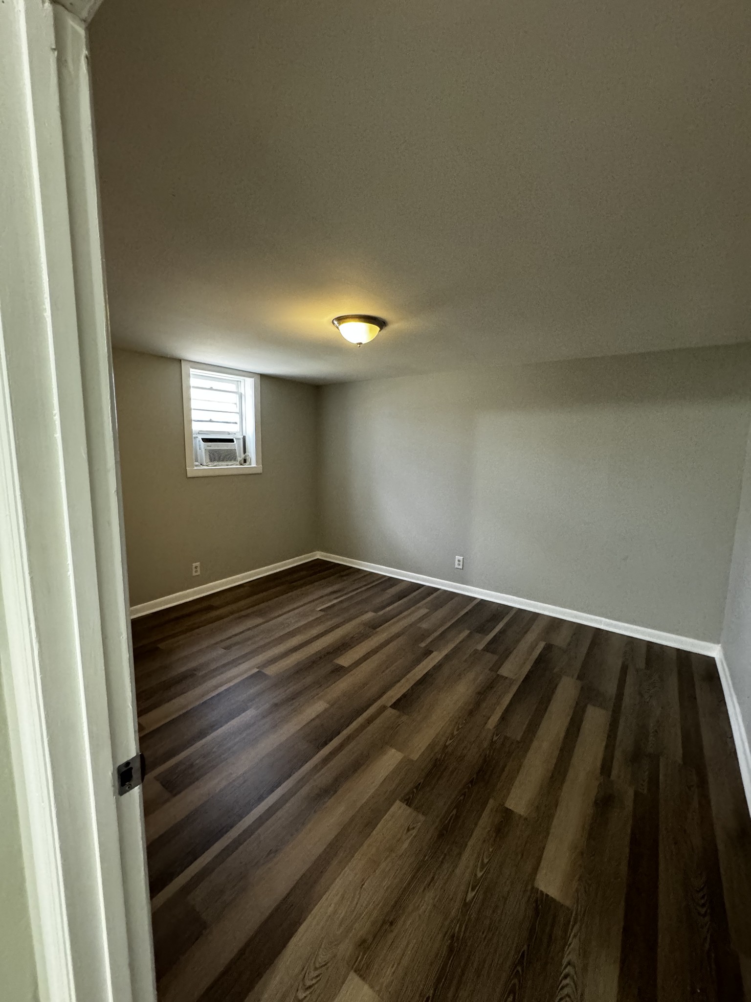 1814 County Hospital Road Nashville, TN 37218 - Photo 16 of 18 a view of an empty room and wooden floor