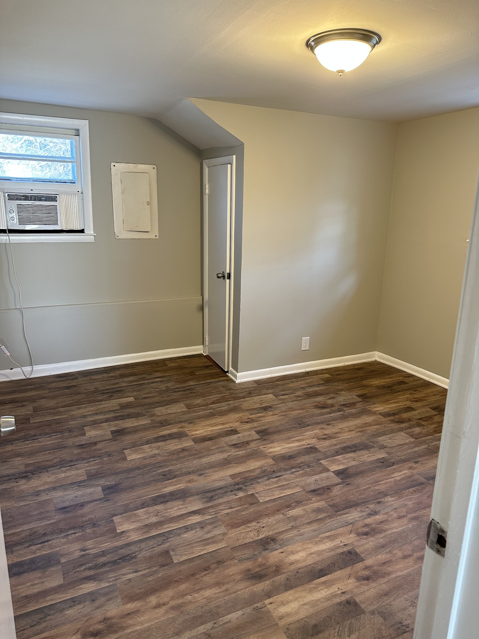 1814 County Hospital Road Nashville, TN 37218 - Photo 3 of 18 a view of an empty room with wooden floor