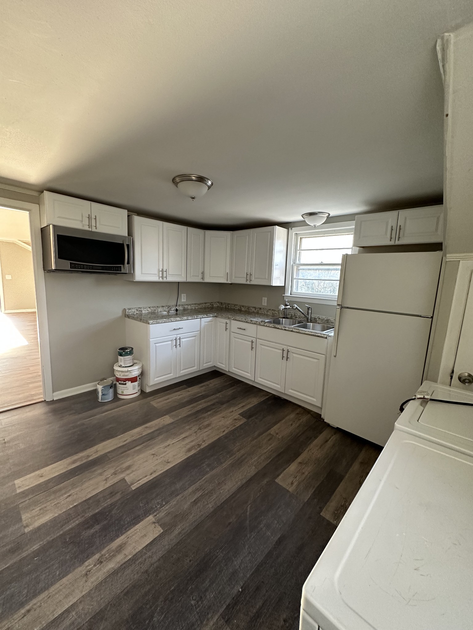 1814 County Hospital Road Nashville, TN 37218 - Photo 8 of 18 a kitchen with granite countertop a sink a stove and refrigerator