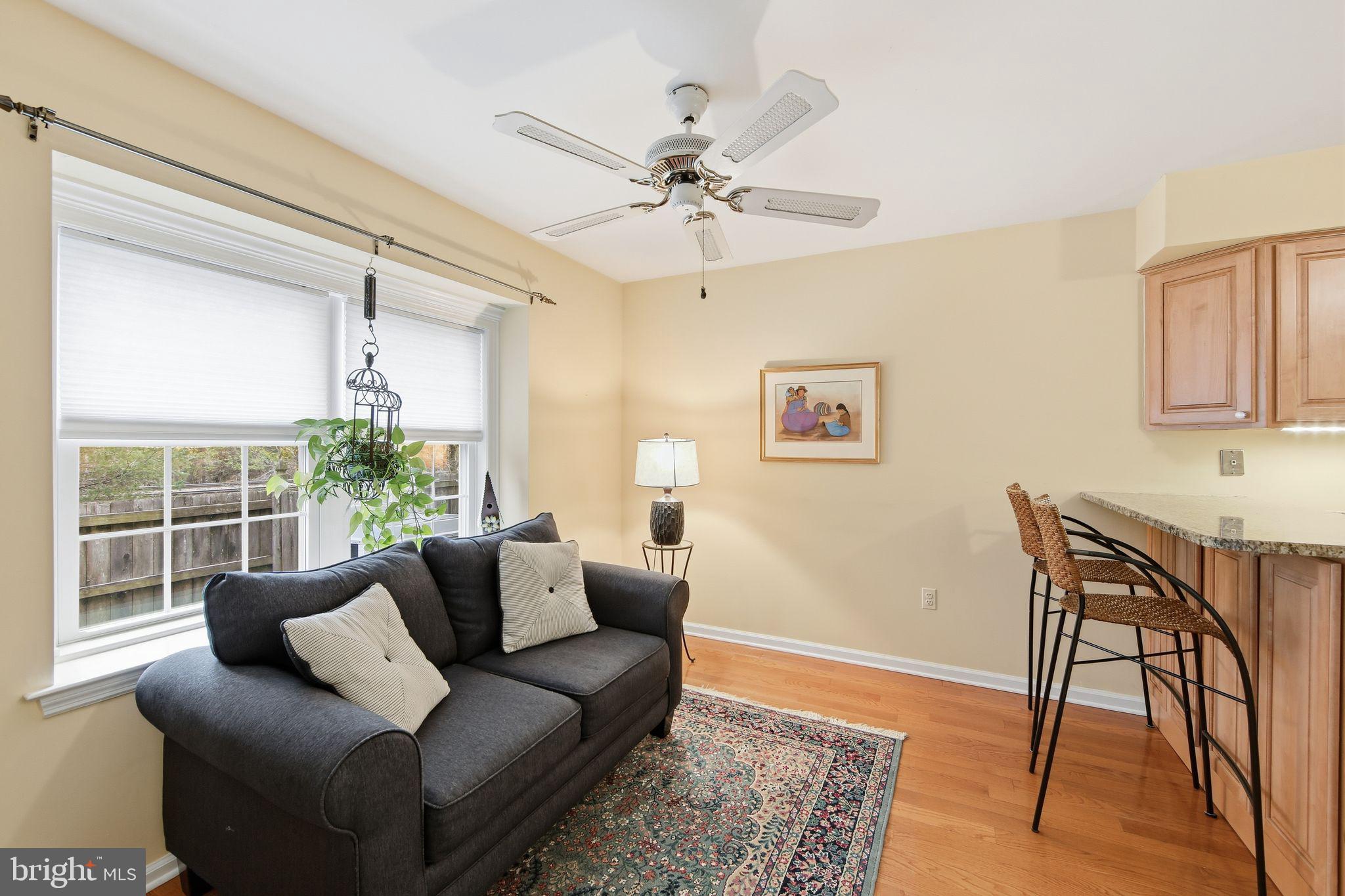 201 Penns Lane, Unit 201 Malvern, PA 19355 - Photo 15 of 30 a living room with furniture and a window
