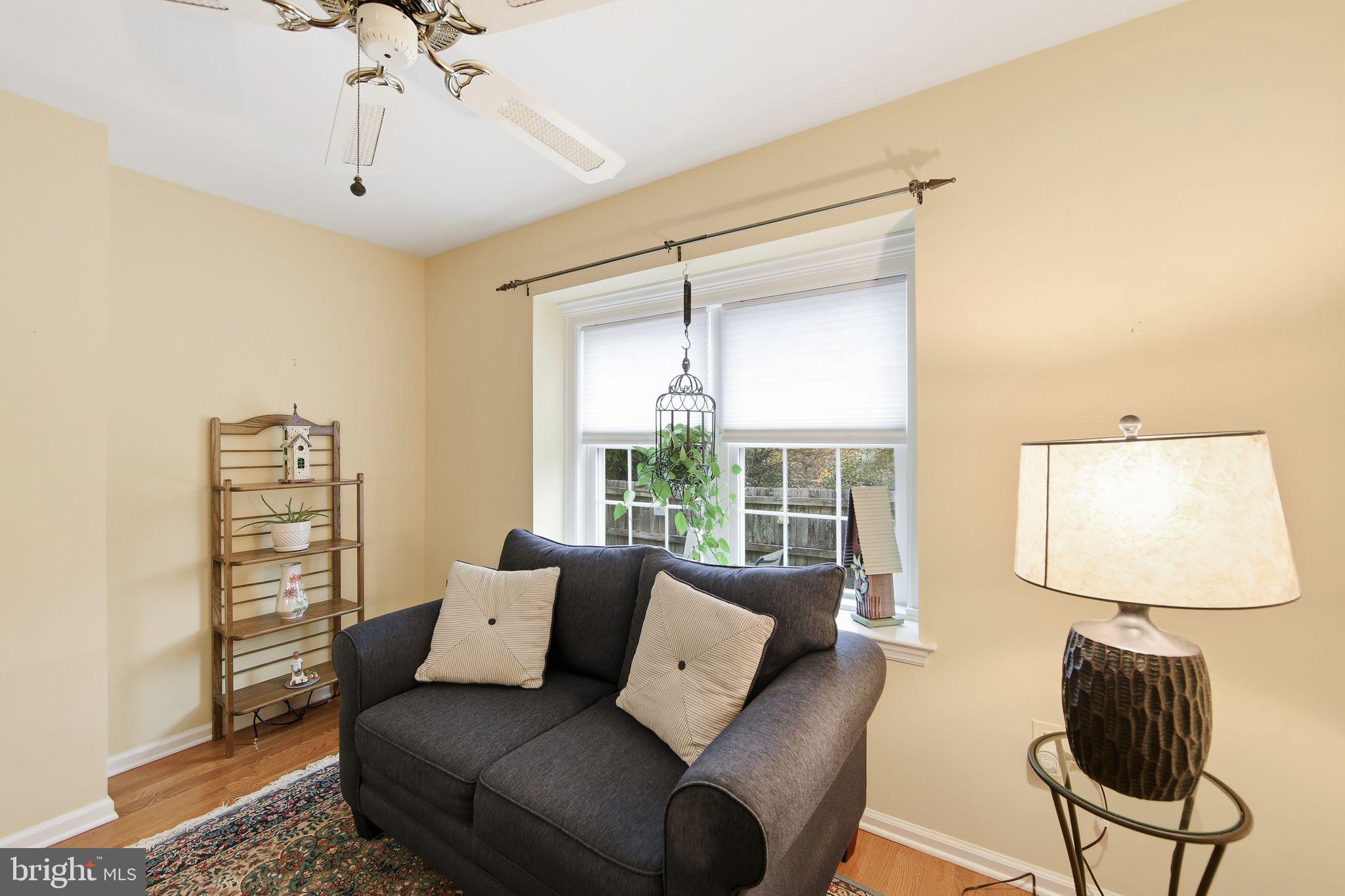 201 Penns Lane, Unit 201 Malvern, PA 19355 - Photo 16 of 30 a living room with furniture and a window