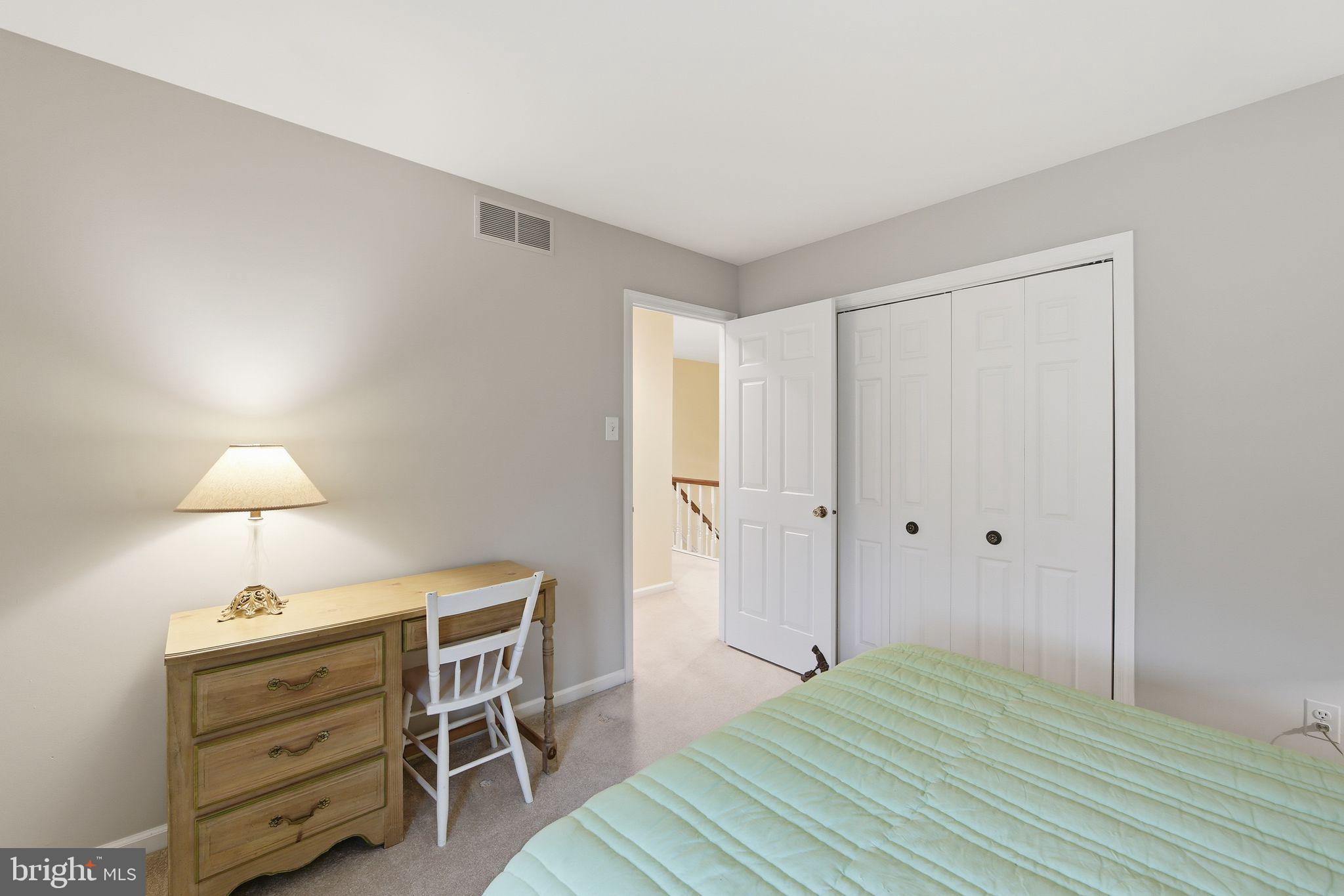 201 Penns Lane, Unit 201 Malvern, PA 19355 - Photo 25 of 30 a view of room with wooden floor and lamp