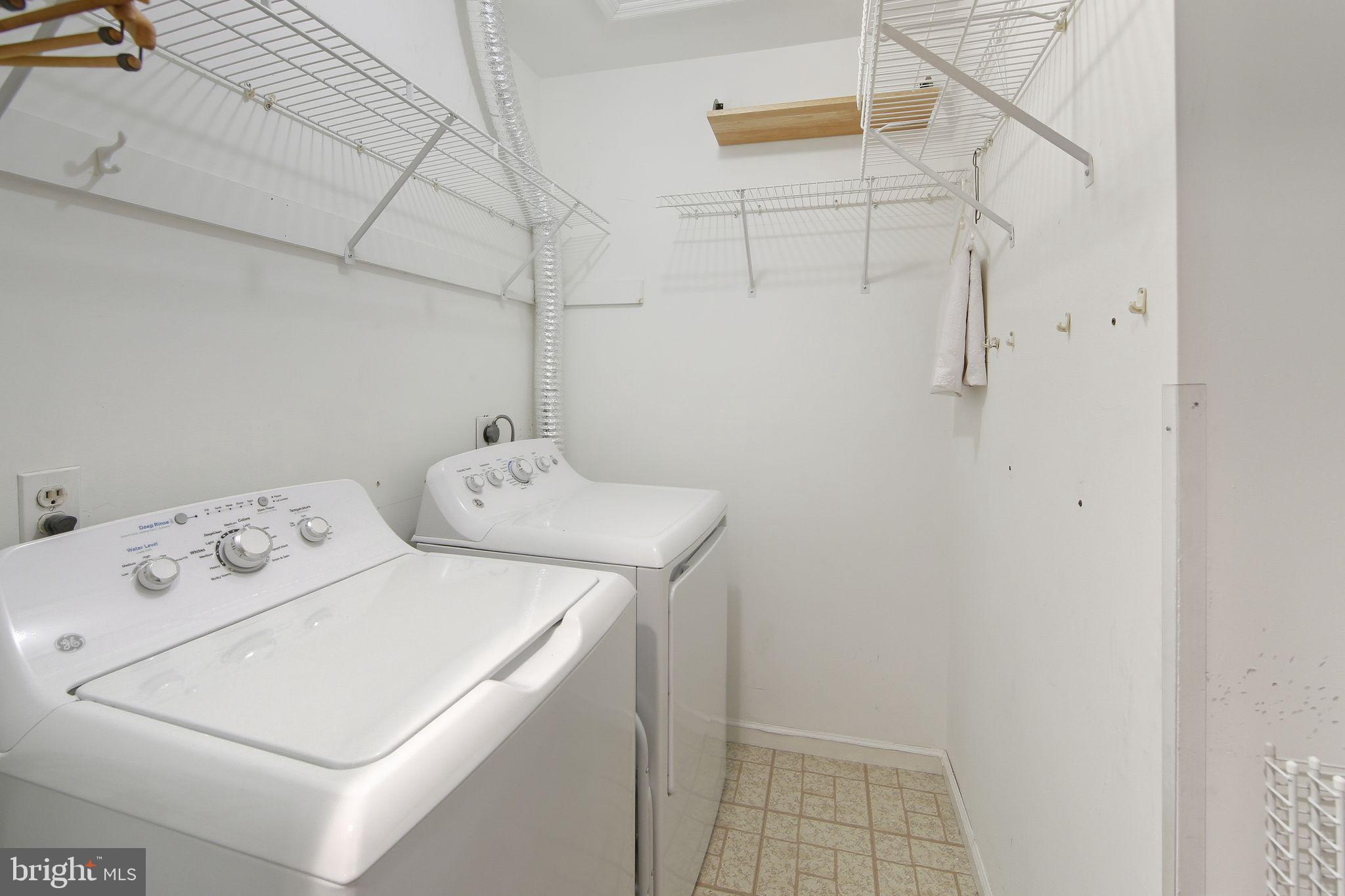 201 Penns Lane, Unit 201 Malvern, PA 19355 - Photo 26 of 30 a utility room with dryer and washer