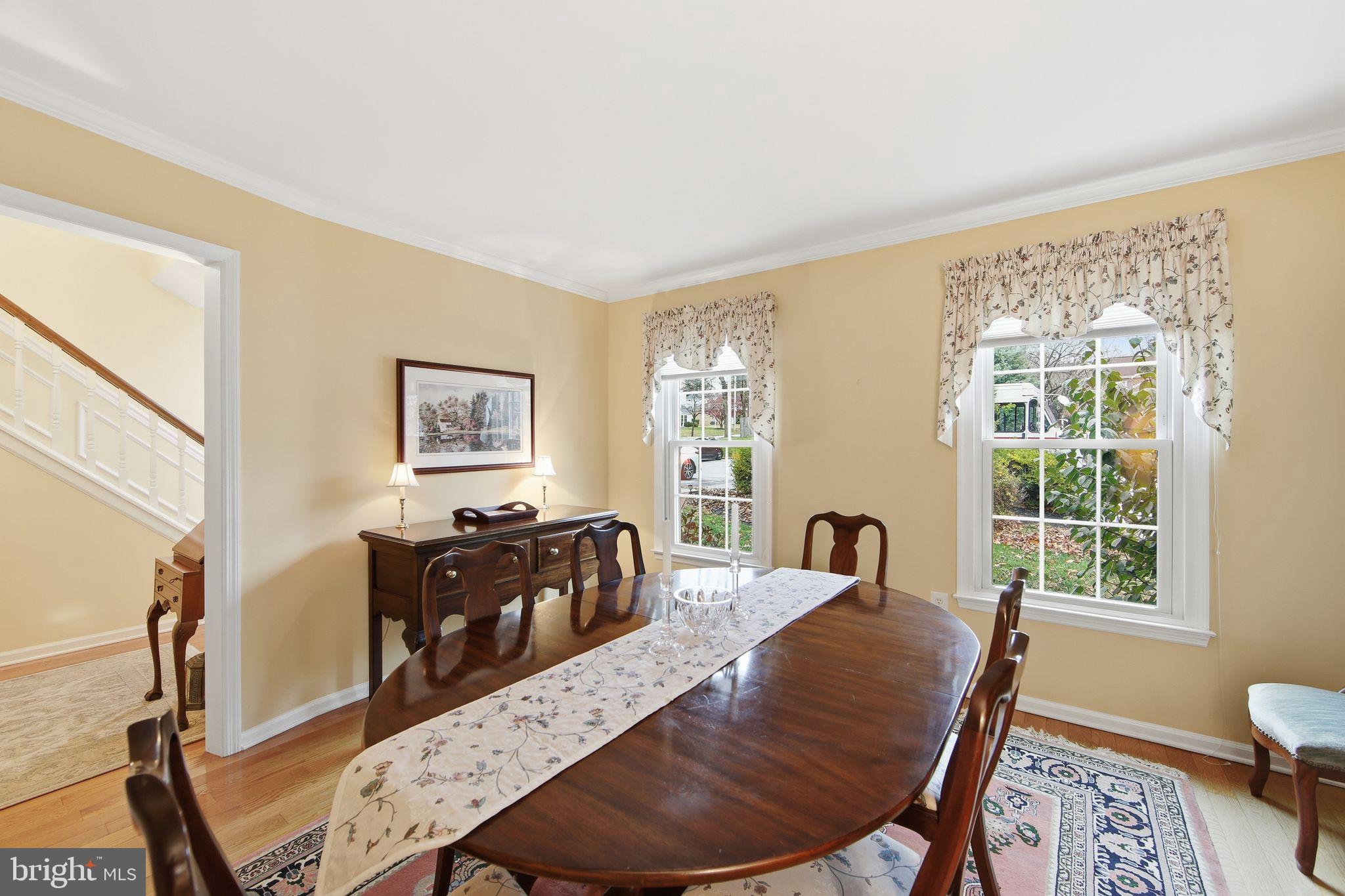201 Penns Lane, Unit 201 Malvern, PA 19355 - Photo 7 of 30 a view of a livingroom with furniture window and wooden floor