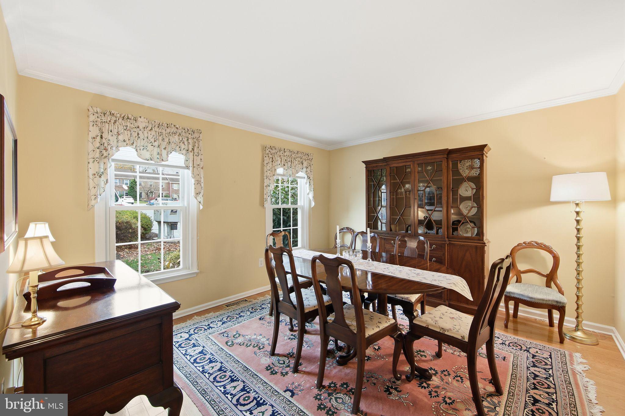 201 Penns Lane, Unit 201 Malvern, PA 19355 - Photo 8 of 30 a view of a dining room with furniture window and outside view
