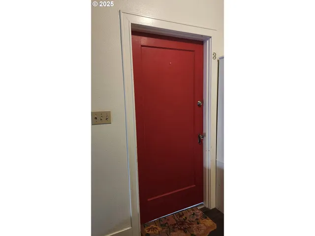 a picture of a room with a door