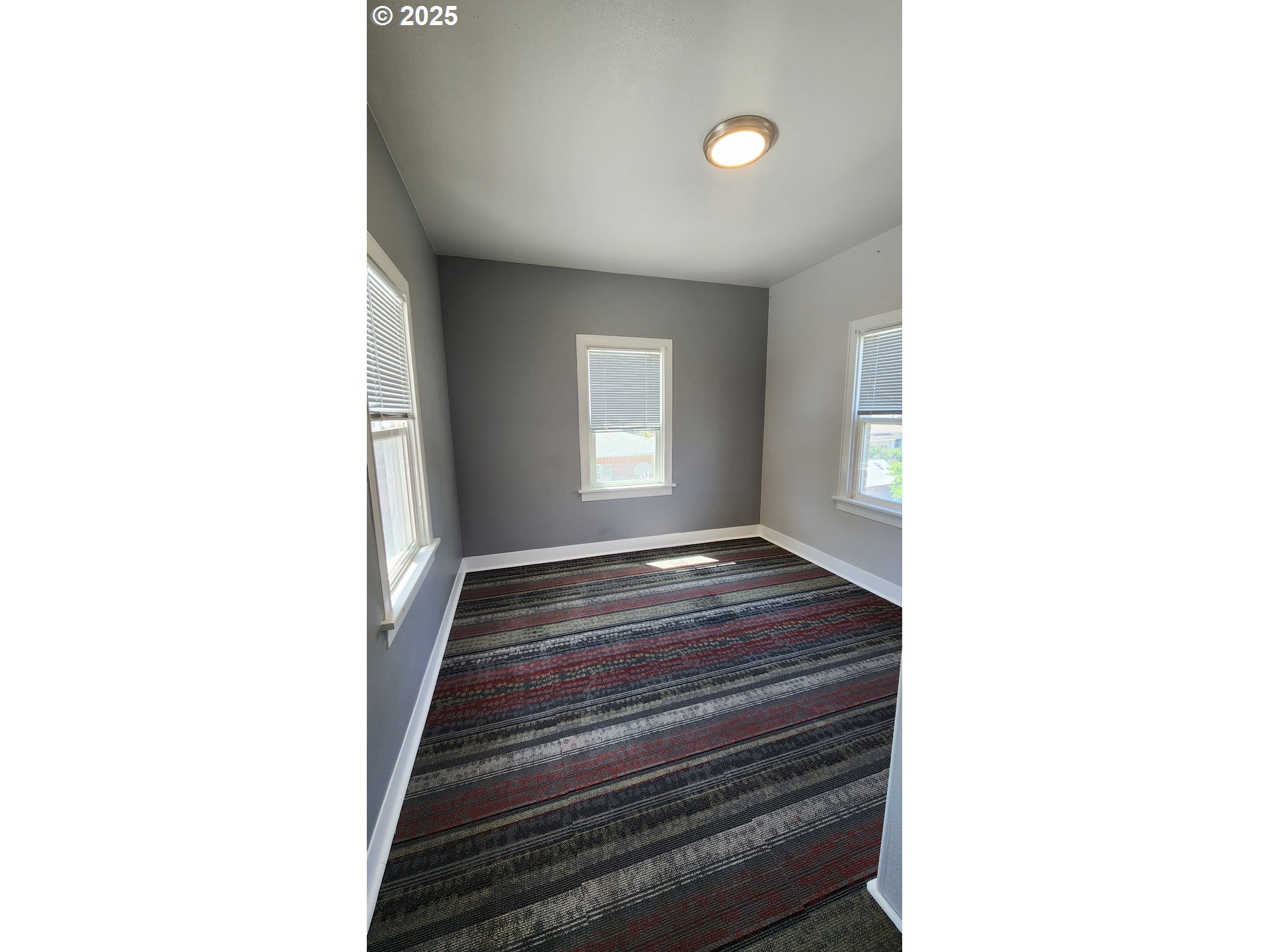 315 Gale Street Heppner, OR 97836 - Photo 20 of 45 a bedroom with a bed and a window