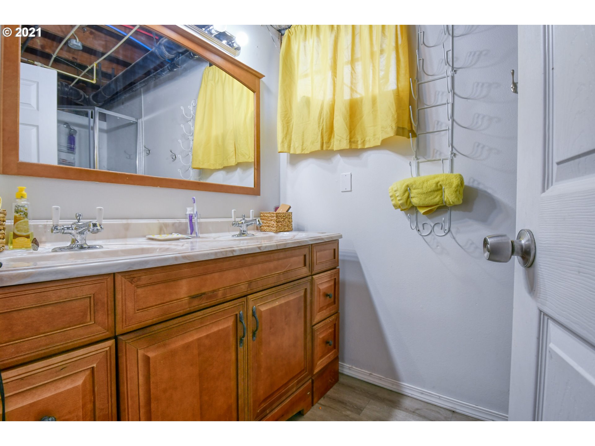 315 Gale Street Heppner, OR 97836 - Photo 40 of 45 a bathroom with a sink and a mirror