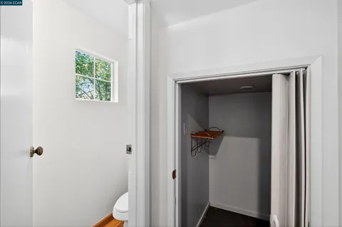 a view of a hallway with closet