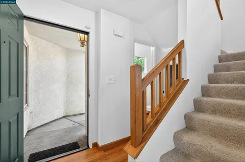 a view of an entryway with staircase