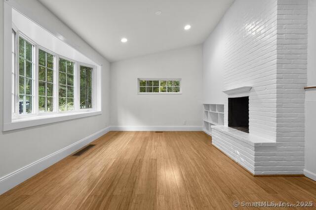 89 Book Hill Road Essex, CT 06426 - Photo 15 of 40 a view of a room with wooden floor and window