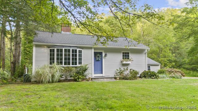 89 Book Hill Road Essex, CT 06426 - Photo 2 of 40 a view of a house with a garden