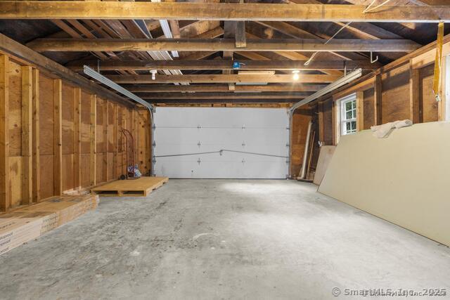 89 Book Hill Road Essex, CT 06426 - Photo 32 of 40 a view of an empty room with wooden walls