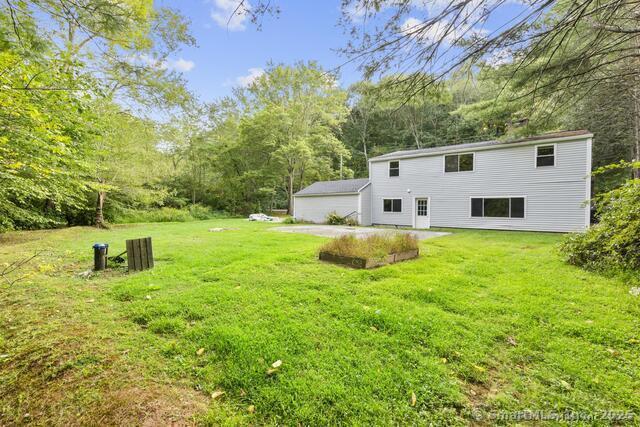 89 Book Hill Road Essex, CT 06426 - Photo 37 of 40 a white house that has a big yard