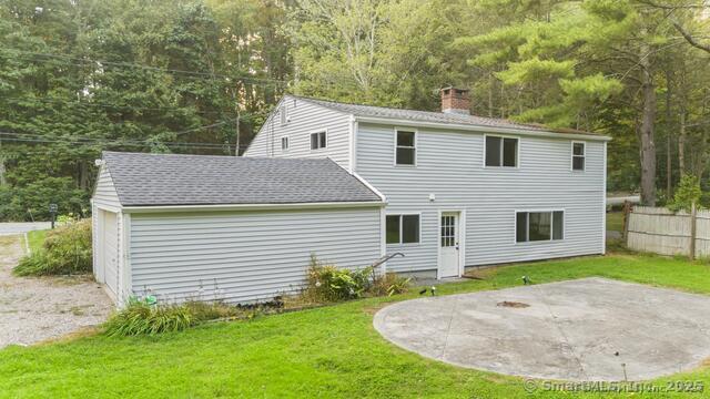 89 Book Hill Road Essex, CT 06426 - Photo 4 of 40 a view of a house with a yard patio and a garden