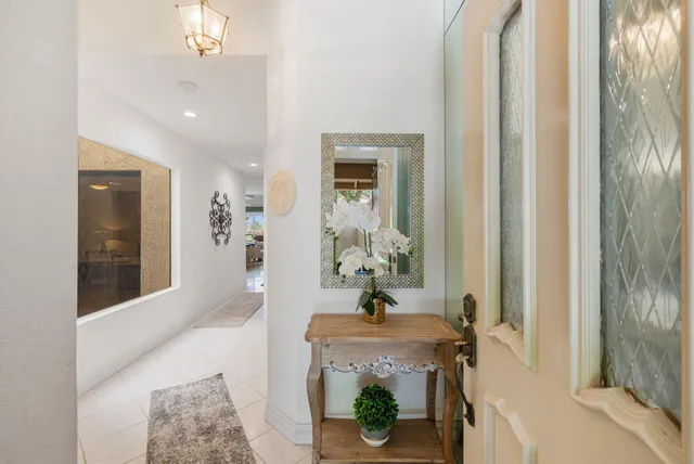 a view of an entryway with wooden floor